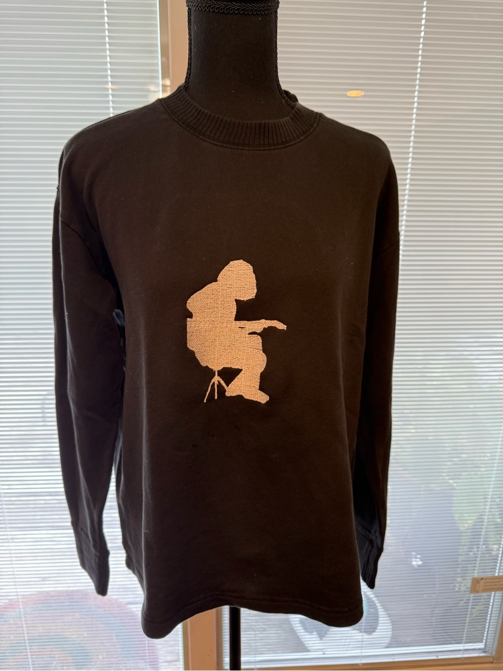 Upcycled Black Long Sleeve Sweatshirt with embriodered white WSP Mikey graphic